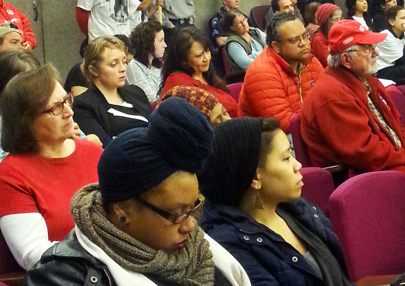 Residents opposed to the planned methanol plant -- many wearing the characteristic red clothes that identify them as supporters of" Redline Tacoma, a local group that has vowed to stop the project -- wait to voice their concerns to the City Council.